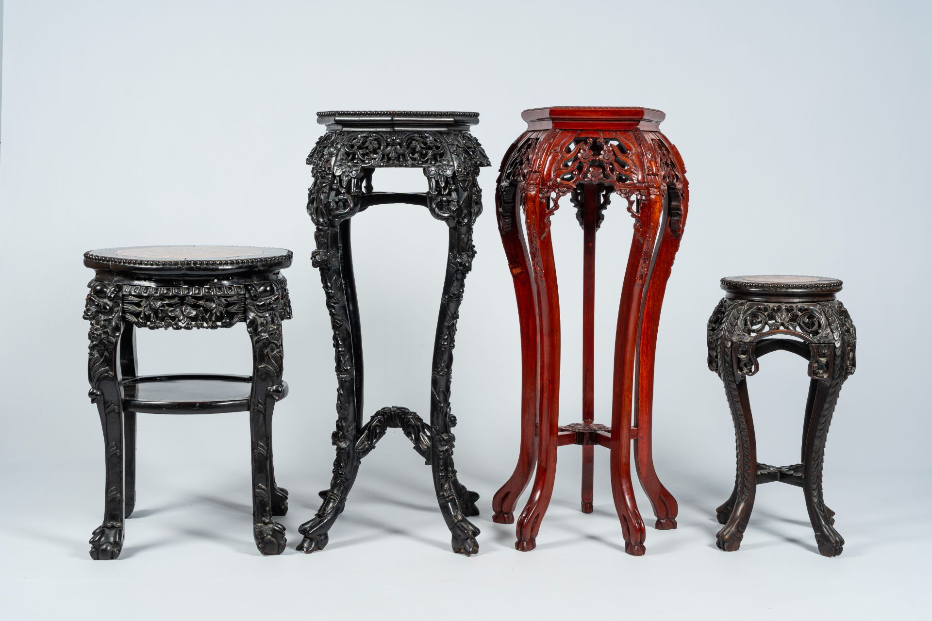 Four Chinese open worked carved wood stands with marble top, 19th/20th C. - Image 4 of 7