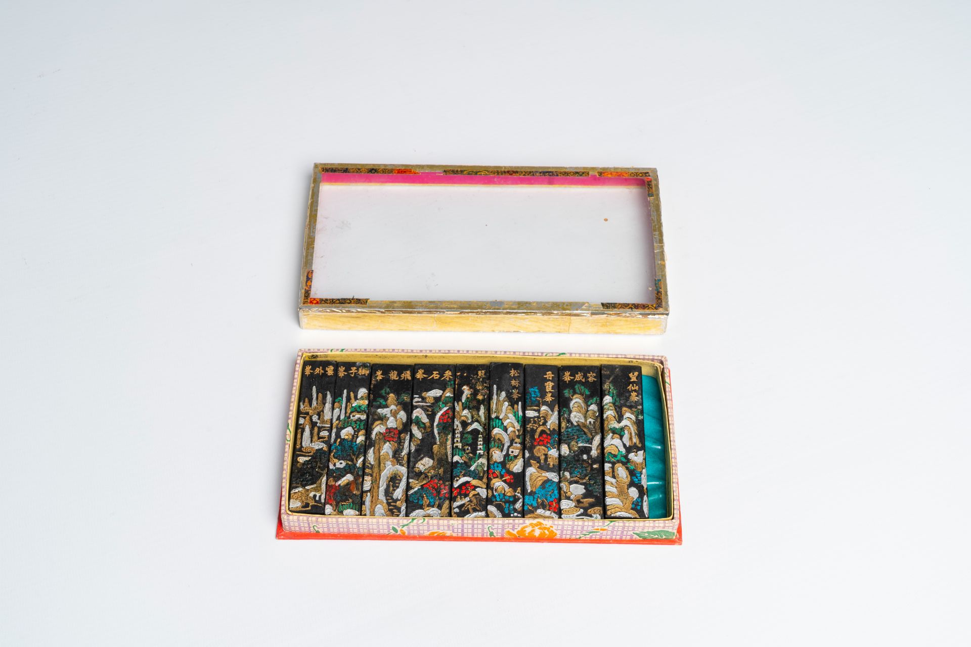 A Chinese polychrome wood sculpture, a collection of printing stamps and a travel case, 19th/20th C. - Image 4 of 11