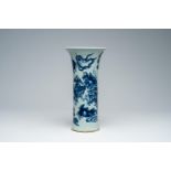 A Chinese blue and white Transitional style beaker vase with warriors in a landscape, 20th C.