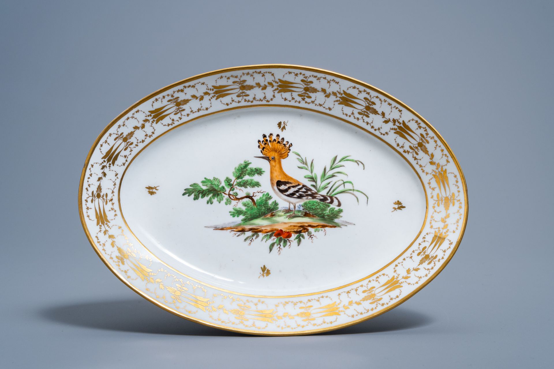 A set of eleven French plates and one oval charger with gilt and polychrome exotic birds design, fir - Image 8 of 9
