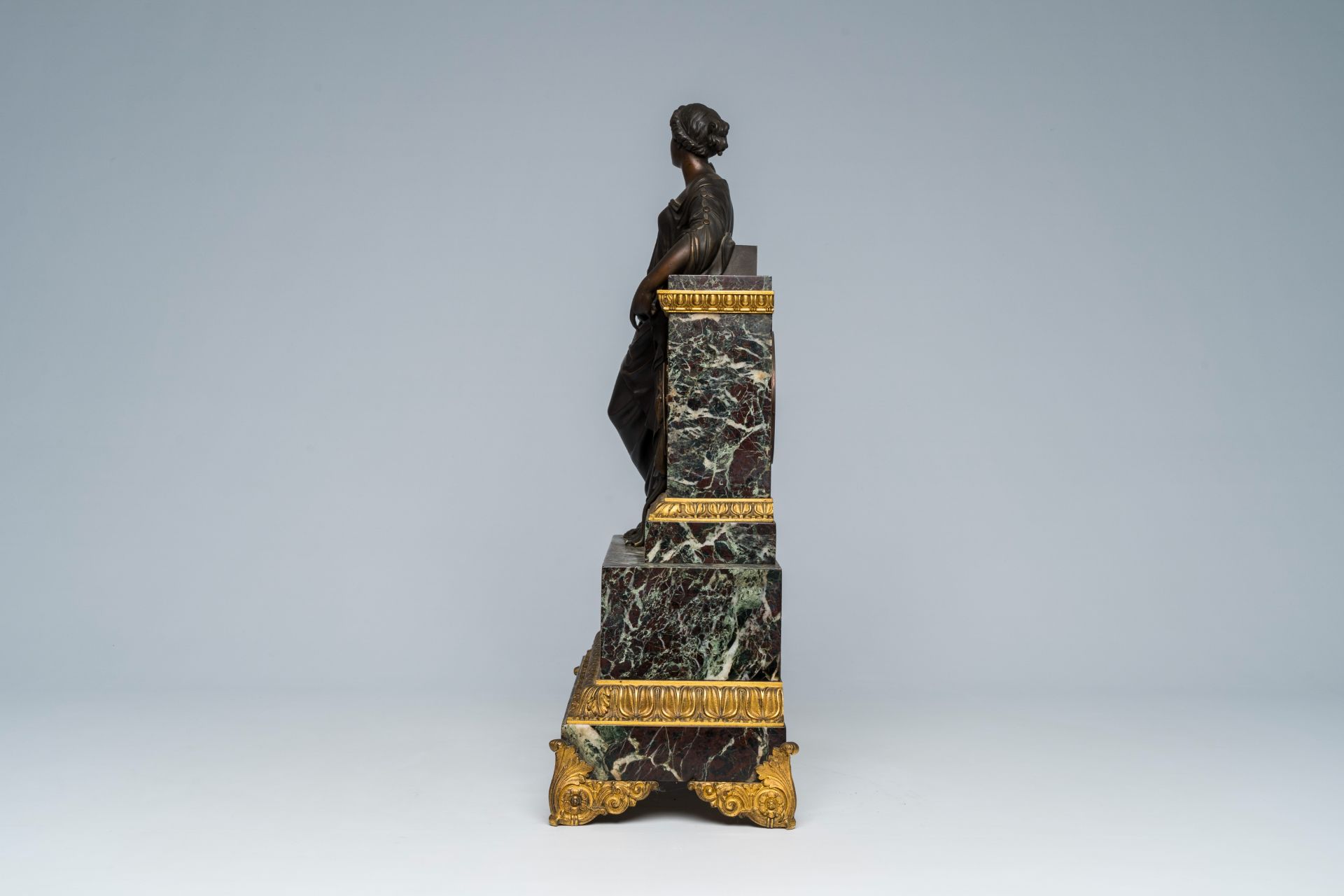 A French gilt and patinated bronze mounted marble mantel clock with an elegant lady, 19th C. - Image 4 of 9