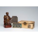 A Chinese polychrome wood sculpture, a collection of printing stamps and a travel case, 19th/20th C.