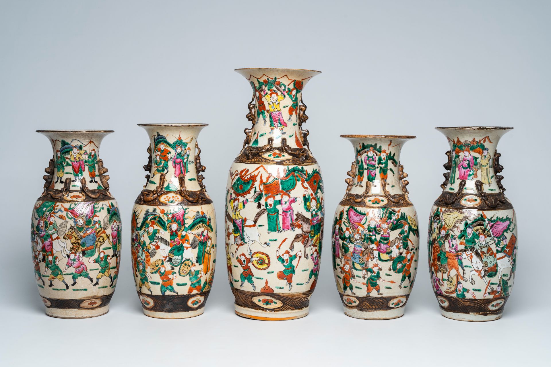 Five Chinese Nanking crackle glazed famille rose vases with warrior scenes, 19th/20th C.