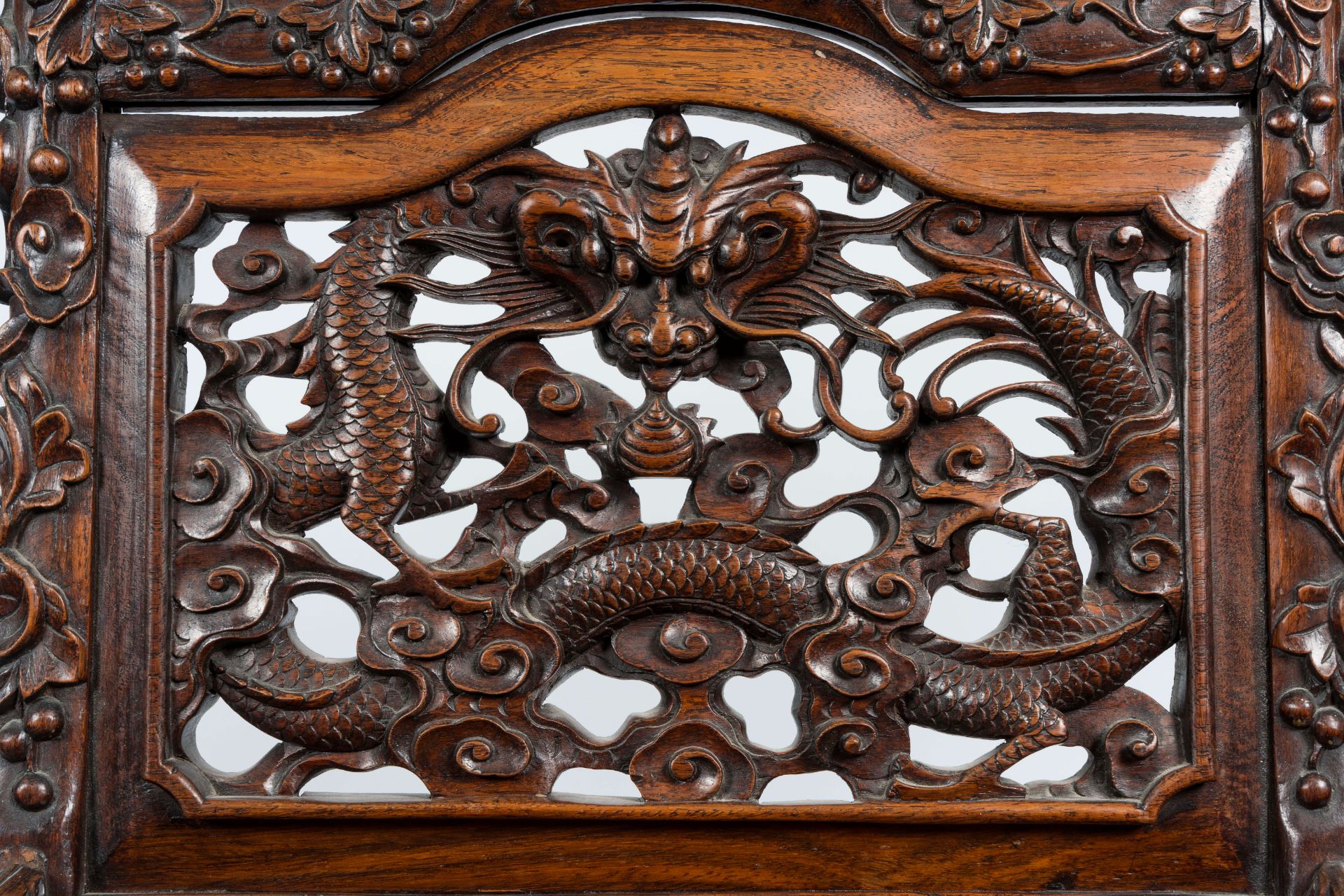 A pair of Chinese carved hardwood 'dragon' chairs, 19th C. - Image 9 of 10