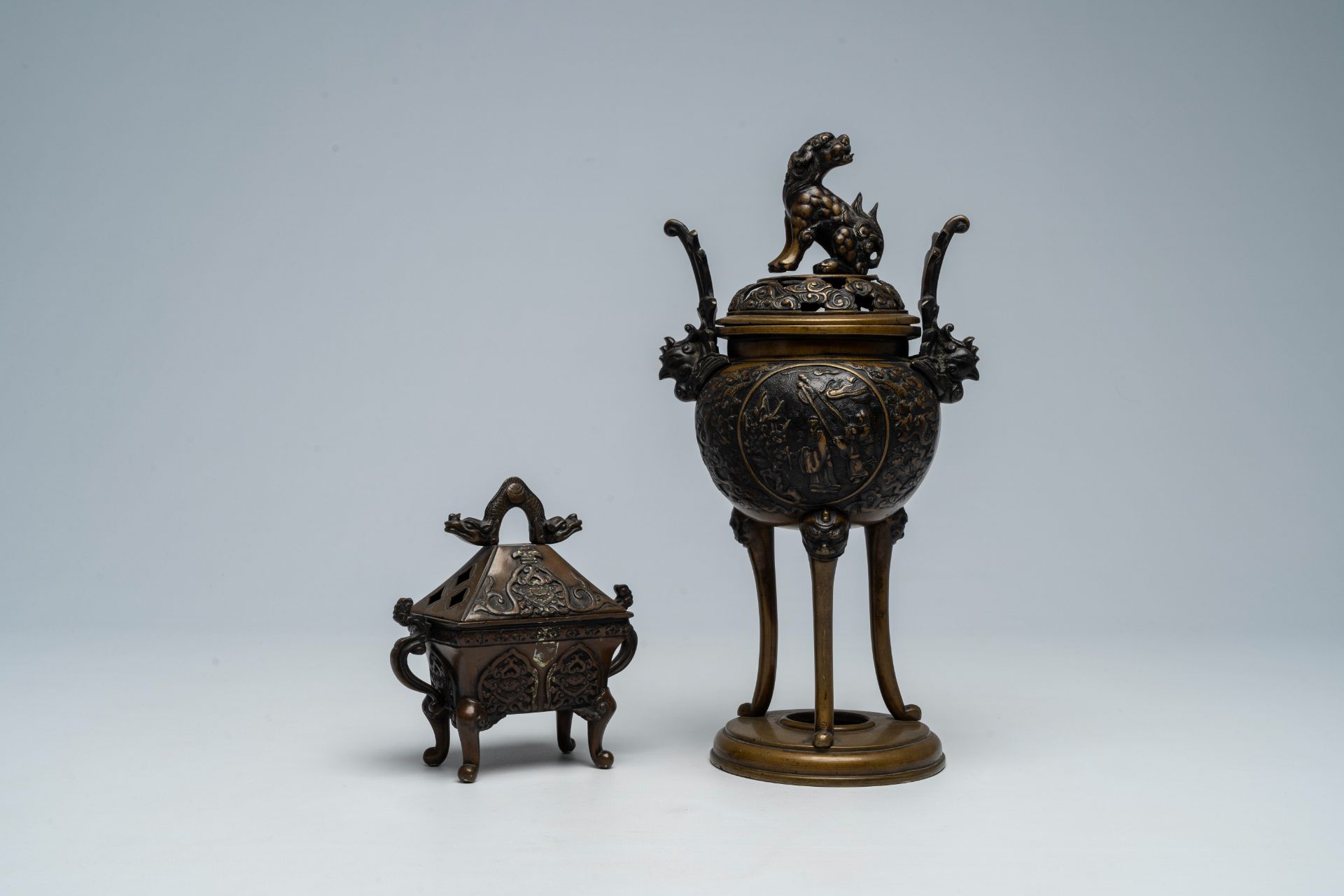 Two Japanese bronze incense burners with relief design, Meiji, 19th C.