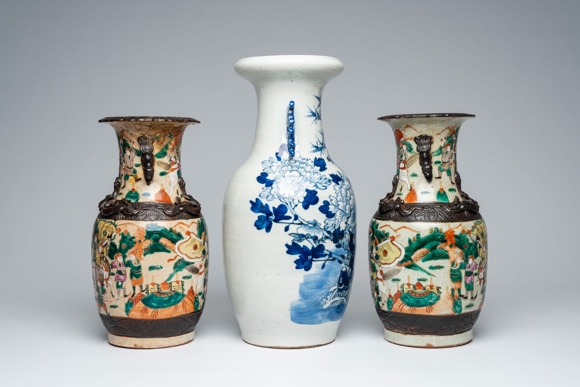 A pair of Chinese Nanking crackle glazed famille rose 'warrior' vases and a blue and white 'phoenix' - Image 5 of 7