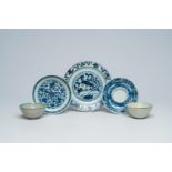 Three Chinese blue and white plates and two bowls, Ming and Kangxi