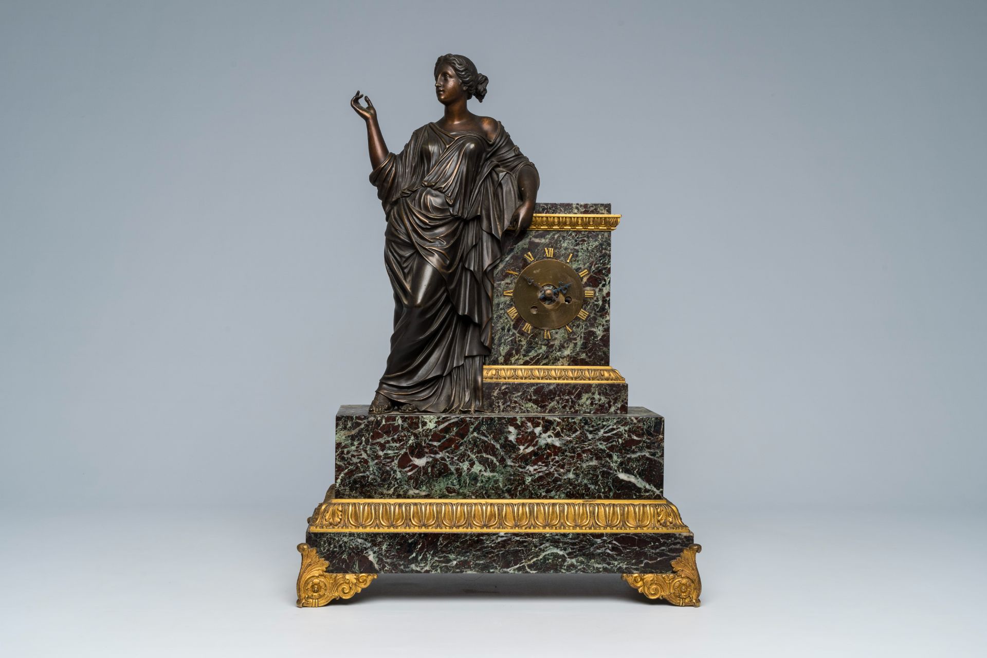 A French gilt and patinated bronze mounted marble mantel clock with an elegant lady, 19th C. - Image 3 of 9