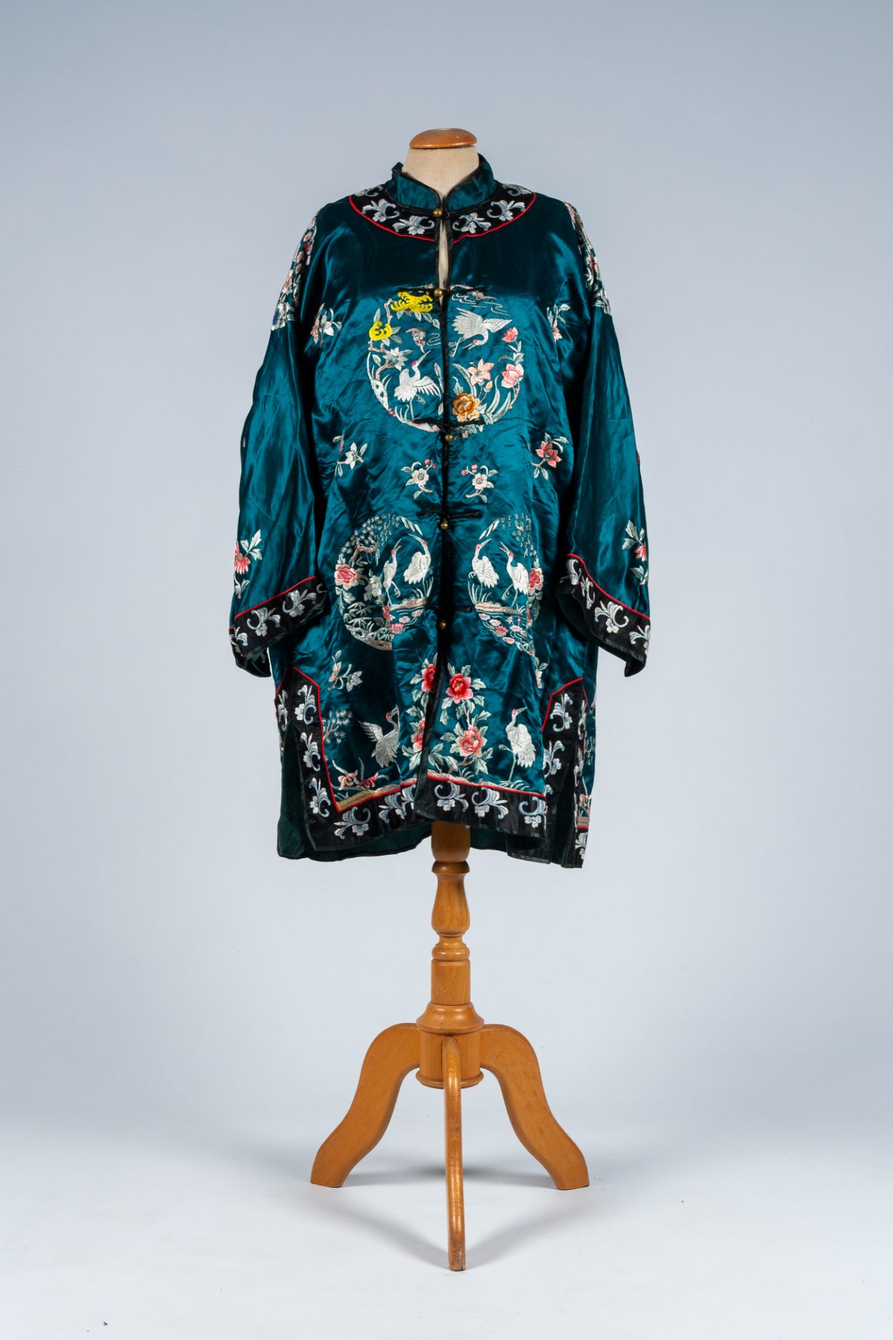 A Chinese embroidered silk altar cloth, a jacket with cranes and two pairs of shoes, 19th C. - Image 3 of 3