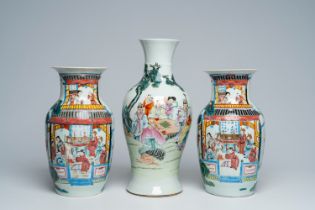 A Chinese famille rose baluster shaped 'Immortals' vase and a pair of vases with palace scenes, 19th
