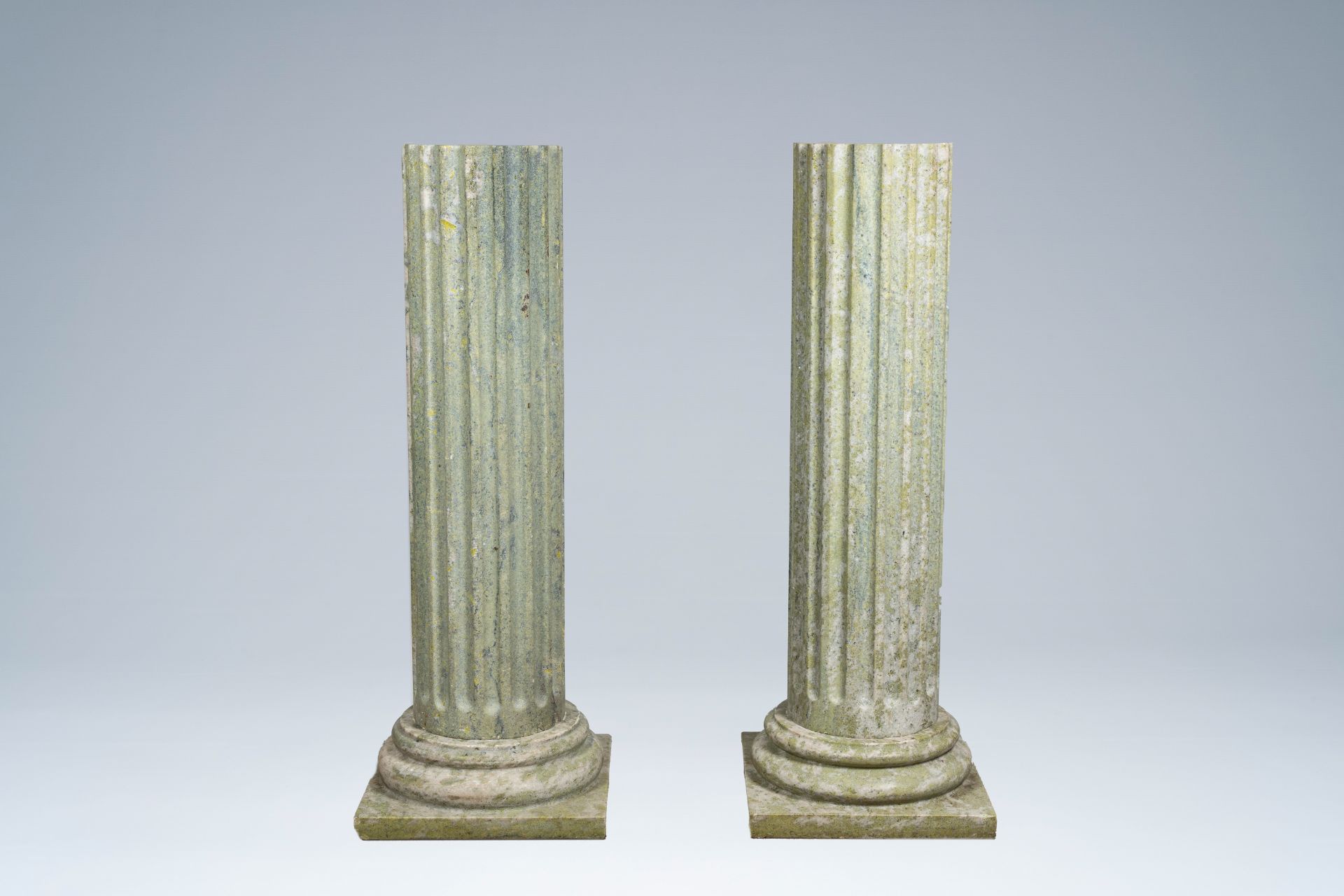A pair of light green natural stone fluted columns, 20th C. - Image 3 of 8