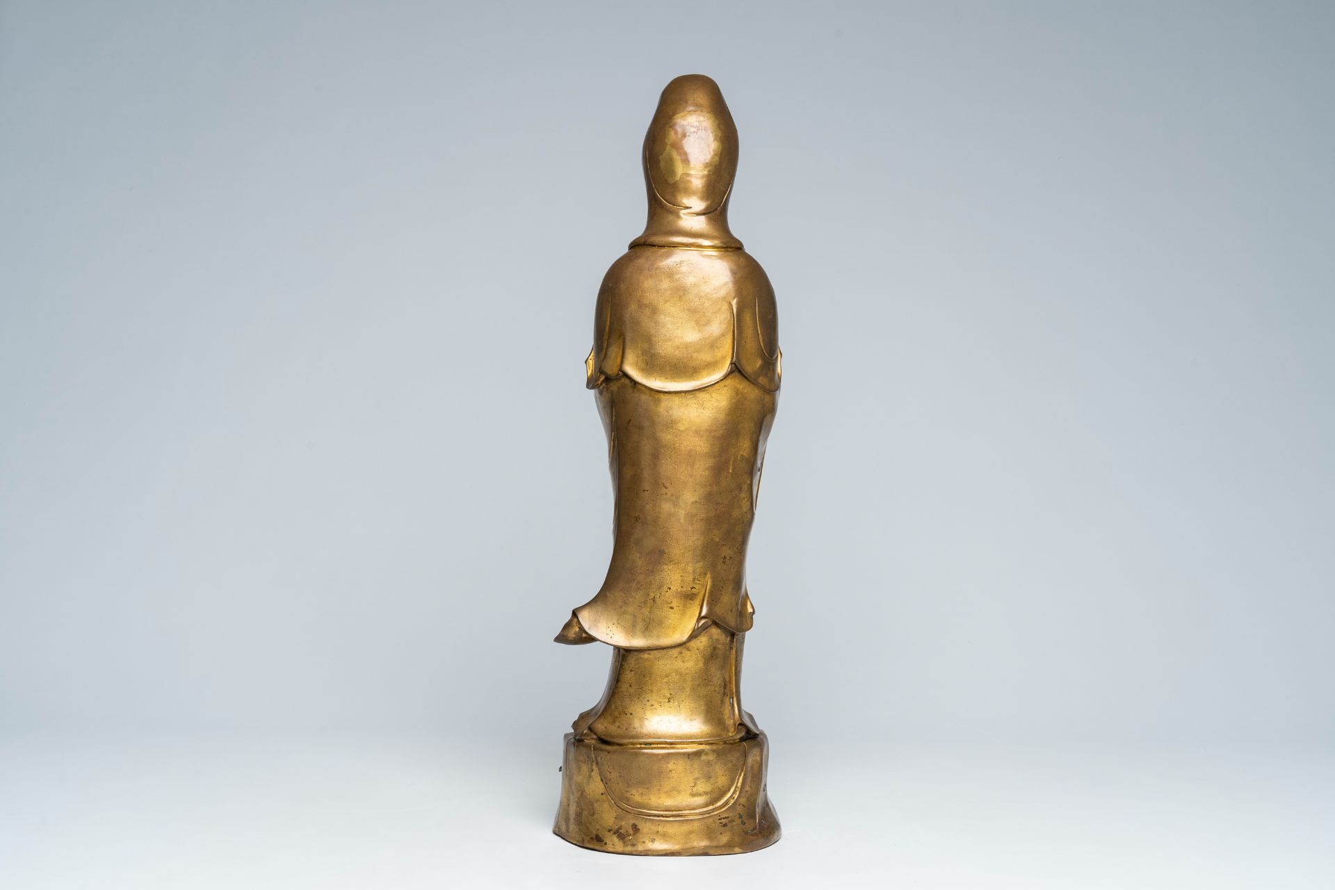 A large Chinese gilt copper sculpture of a standing Guanyin with ruyi sceptre on a lotus throne, Rep - Image 4 of 7