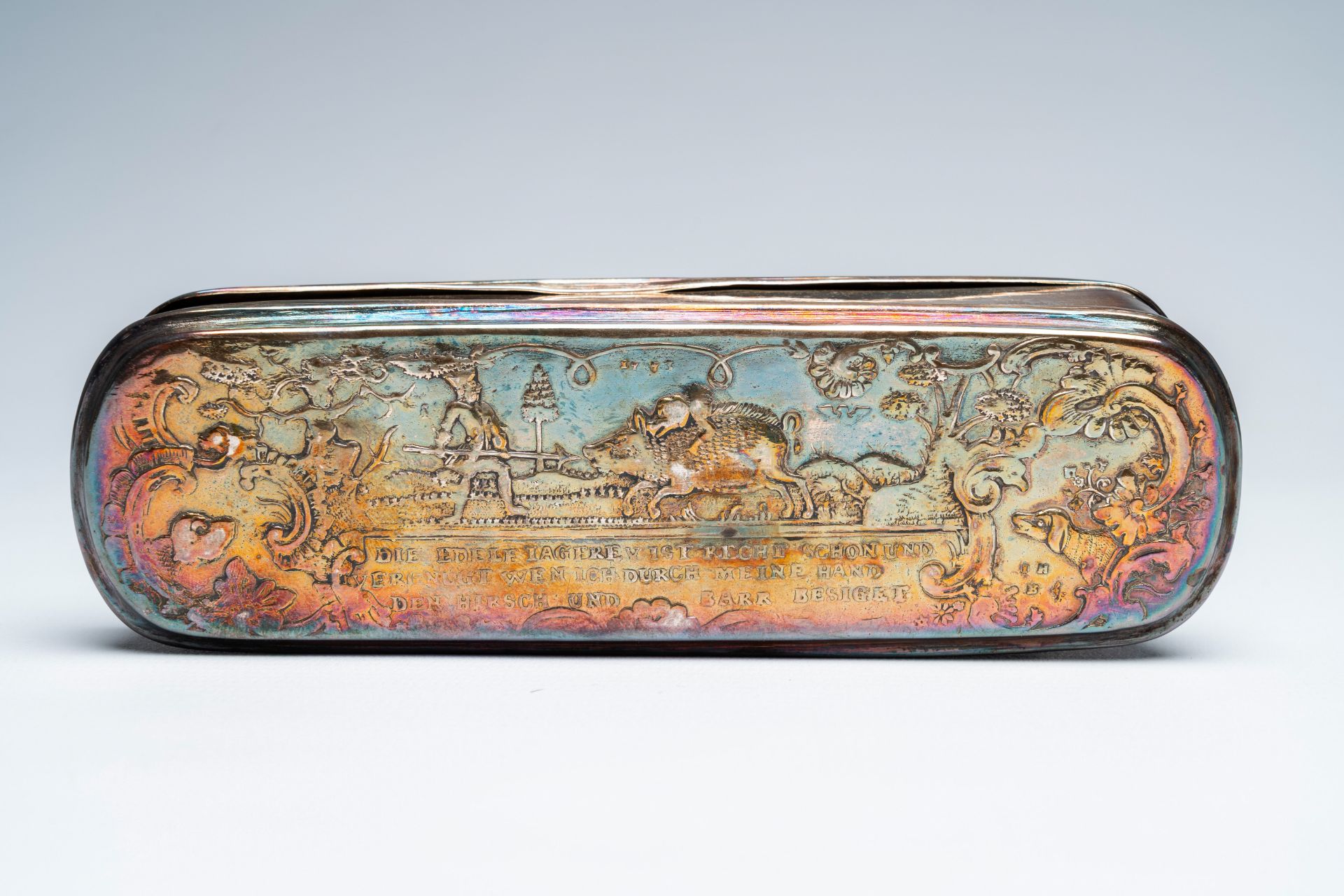 A German silver tobacco box with hunting scenes and an engraved Dutch brass box, 18th/19th c. - Image 9 of 12