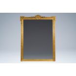 A large French Louis XVI style gilt wood mirror, 20th C.