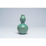 A Chinese crackle glazed celadon double gourd vase, 19th C.