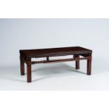 A Chinese rectangular wood 'kang' table, 20th C.