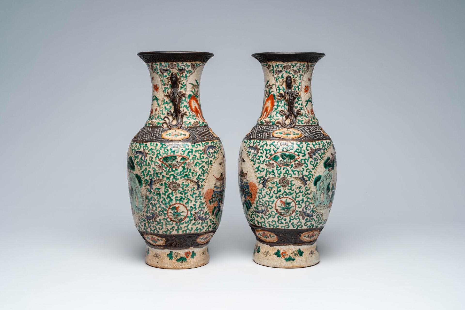 A pair of Chinese Nanking crackle glazed famille verte 'Immortals' vases, 19th C. - Image 2 of 6