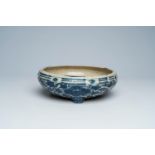 A Chinese Swatow blue and white 'trigrams and flowers' tripod censer, Ming