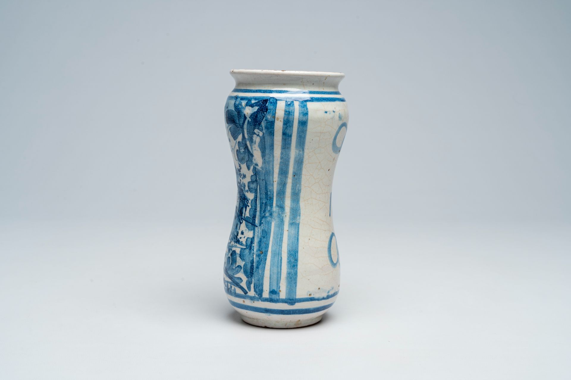 An Italian blue and white albarello with a landscape, dated 1710 - Image 2 of 6