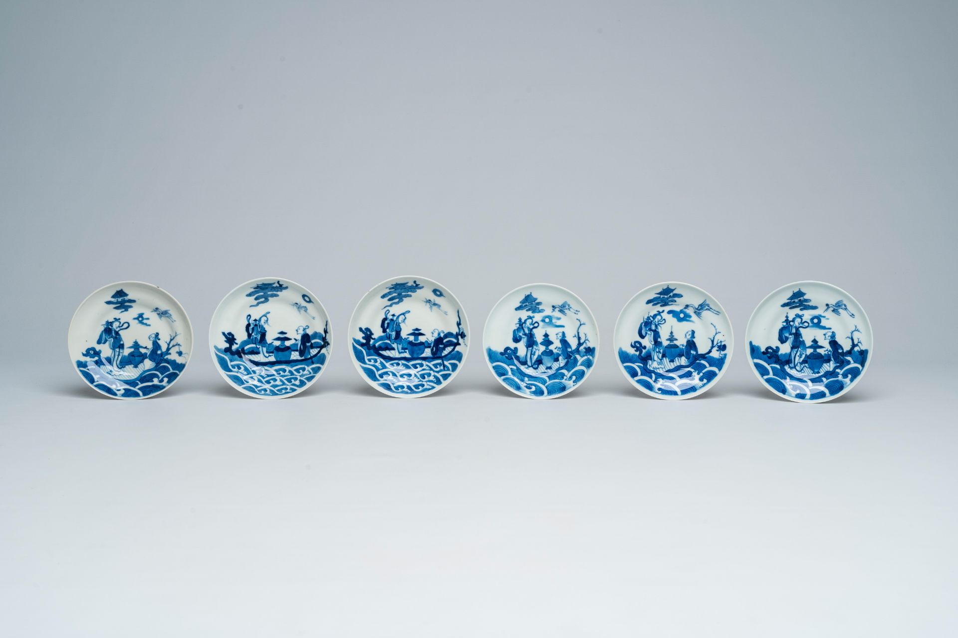 Six Chinese blue and white cups and saucers with Immortals in a boat, Daoguang - Image 2 of 9