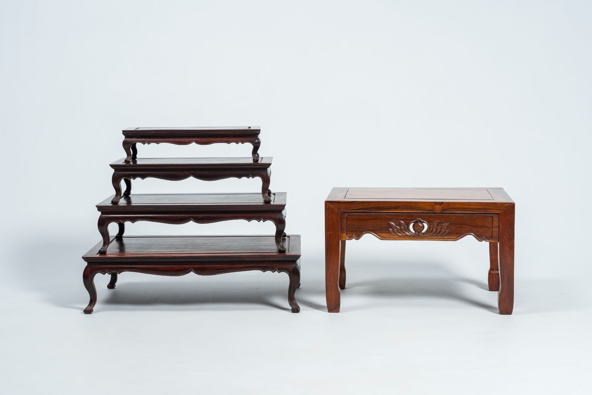 Four Chinese rectangular wood nesting tables and a side table with floral design, 20th C. - Image 3 of 8