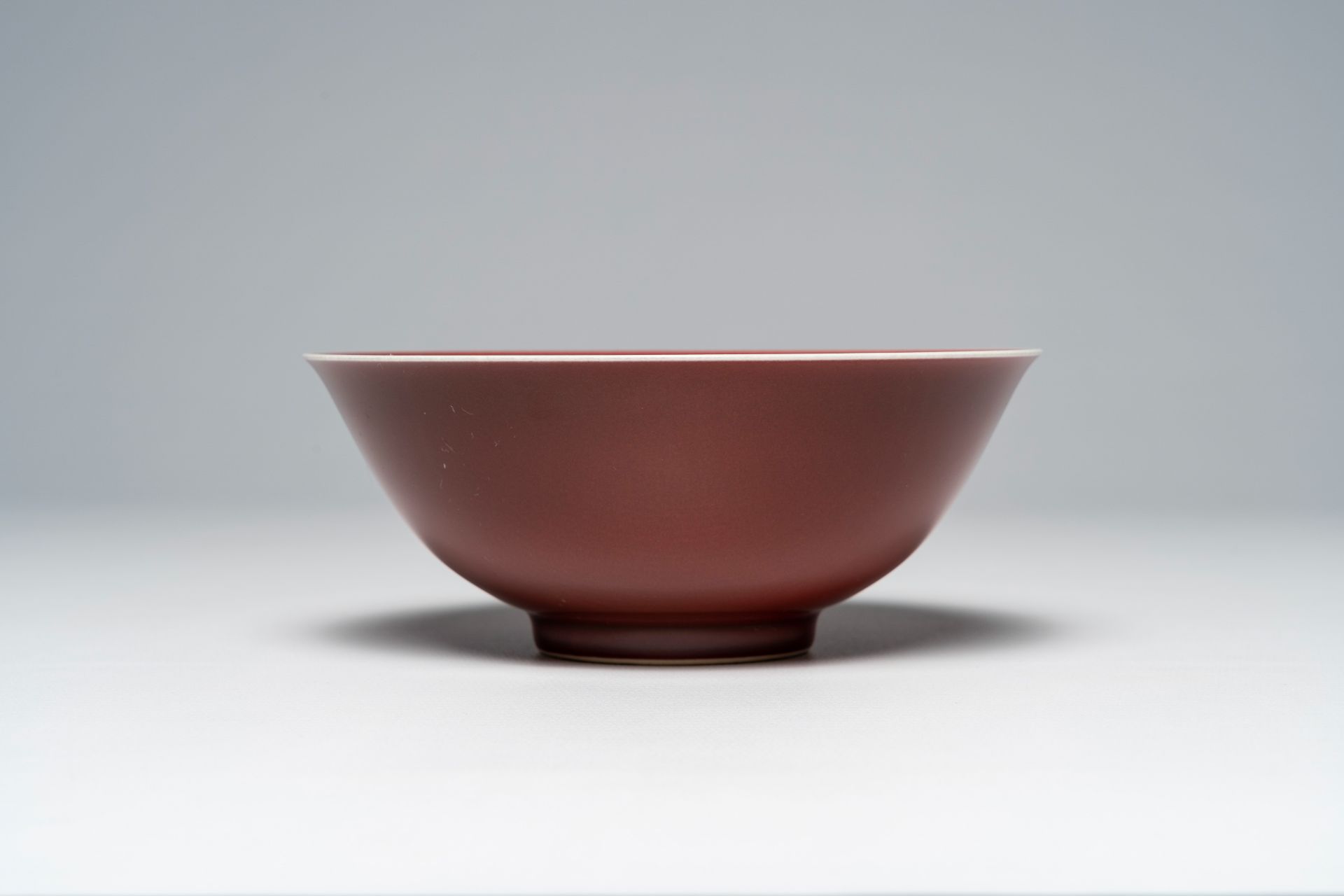 A Chinese monochrome liver red bowl, Qianlong mark, 19th/20th C. - Image 4 of 7