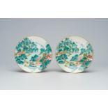 A pair of Chinese famille rose plates with a river landscape, Jiaqing mark, 19th/20th C.