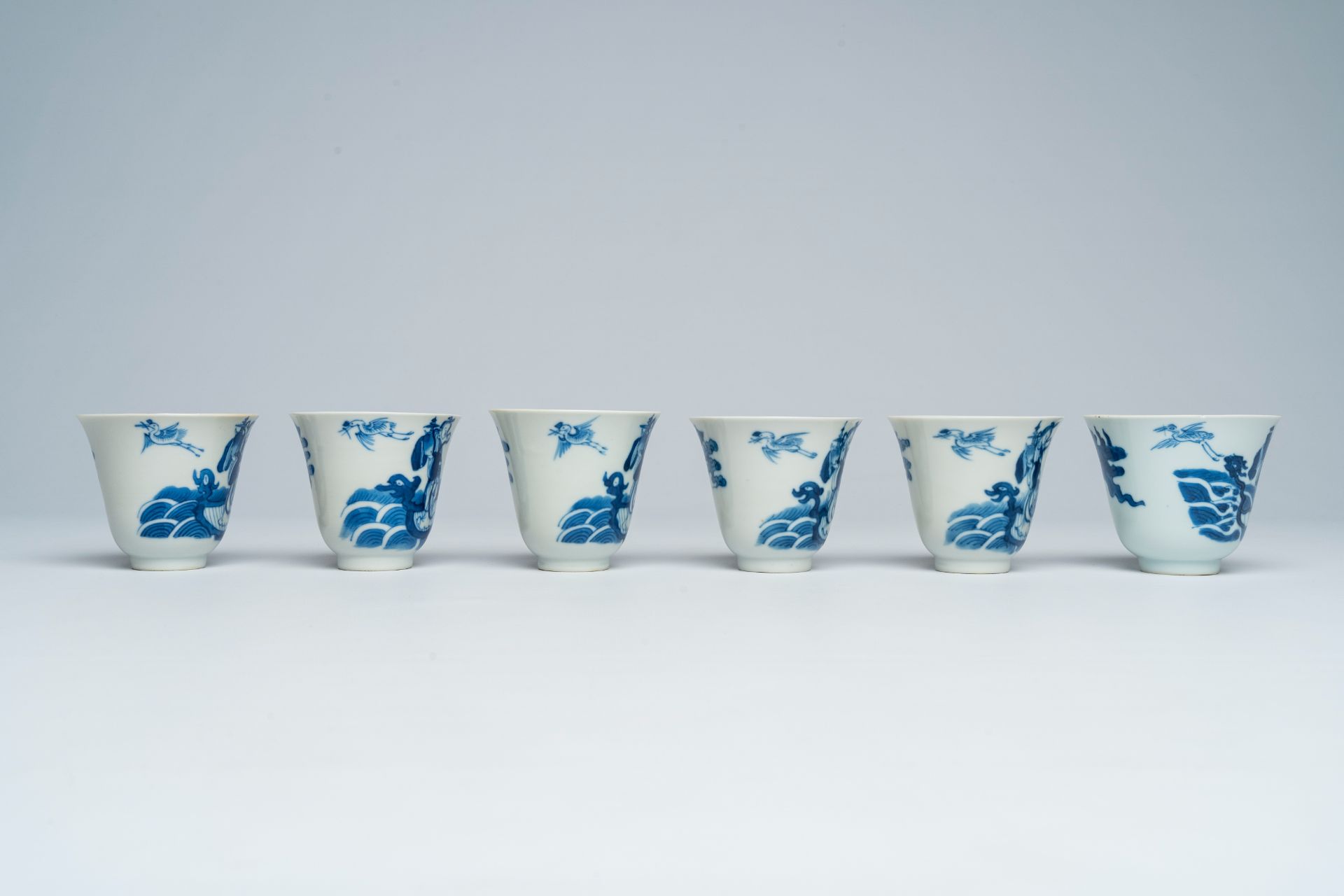 Six Chinese blue and white cups and saucers with Immortals in a boat, Daoguang - Image 7 of 9