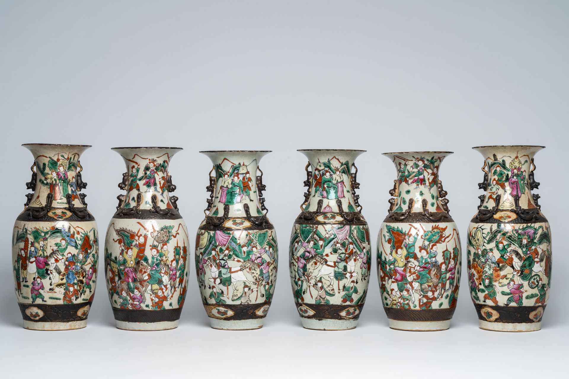 Six Chinese Nanking crackle glazed famille rose 'warrior' vases, 19th/20th C.