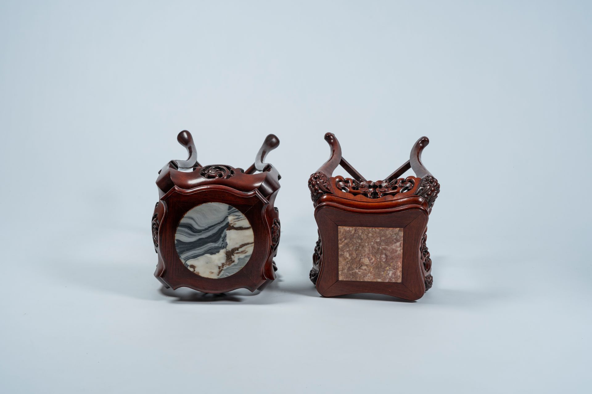 Two Chinese open worked carved wood stands with marble and dreamstone top, 20th C. - Image 6 of 7