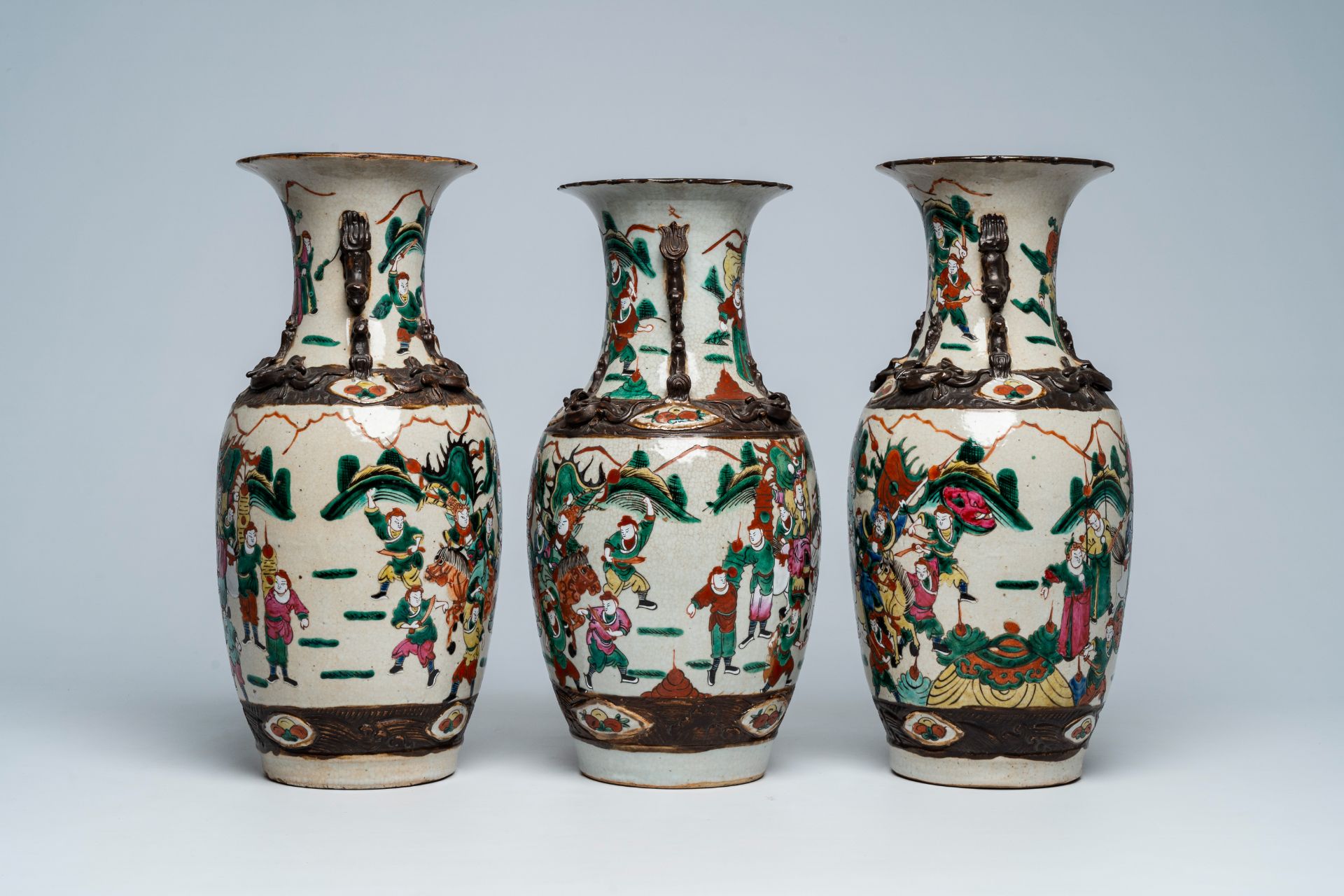 Three Chinese Nanking crackle glazed famille rose 'warrior' vases, 19th C. - Image 2 of 6