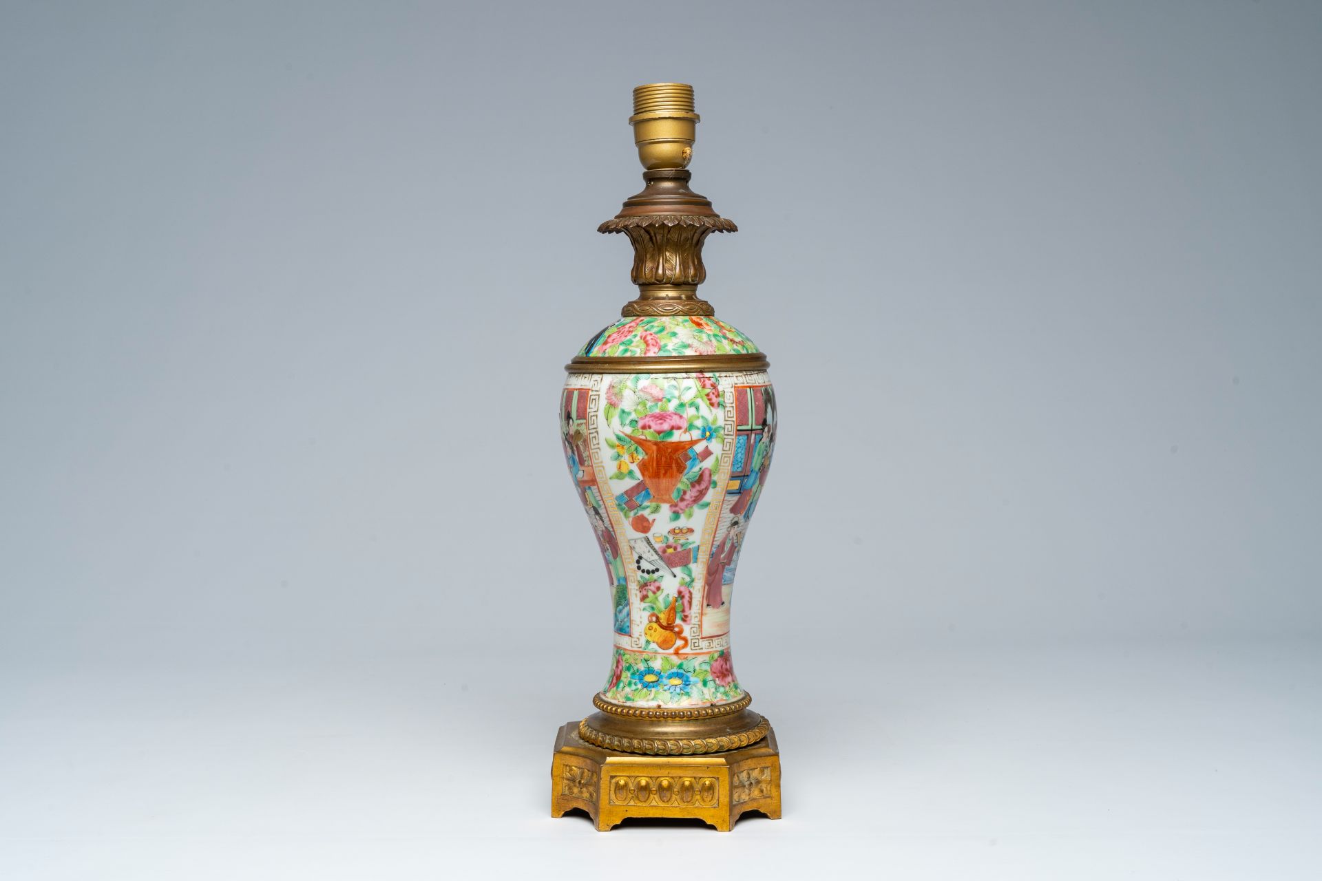 A Chinese Canton famille rose vase with palace scenes and floral design mounted as a lamp, 19th C. - Image 2 of 6