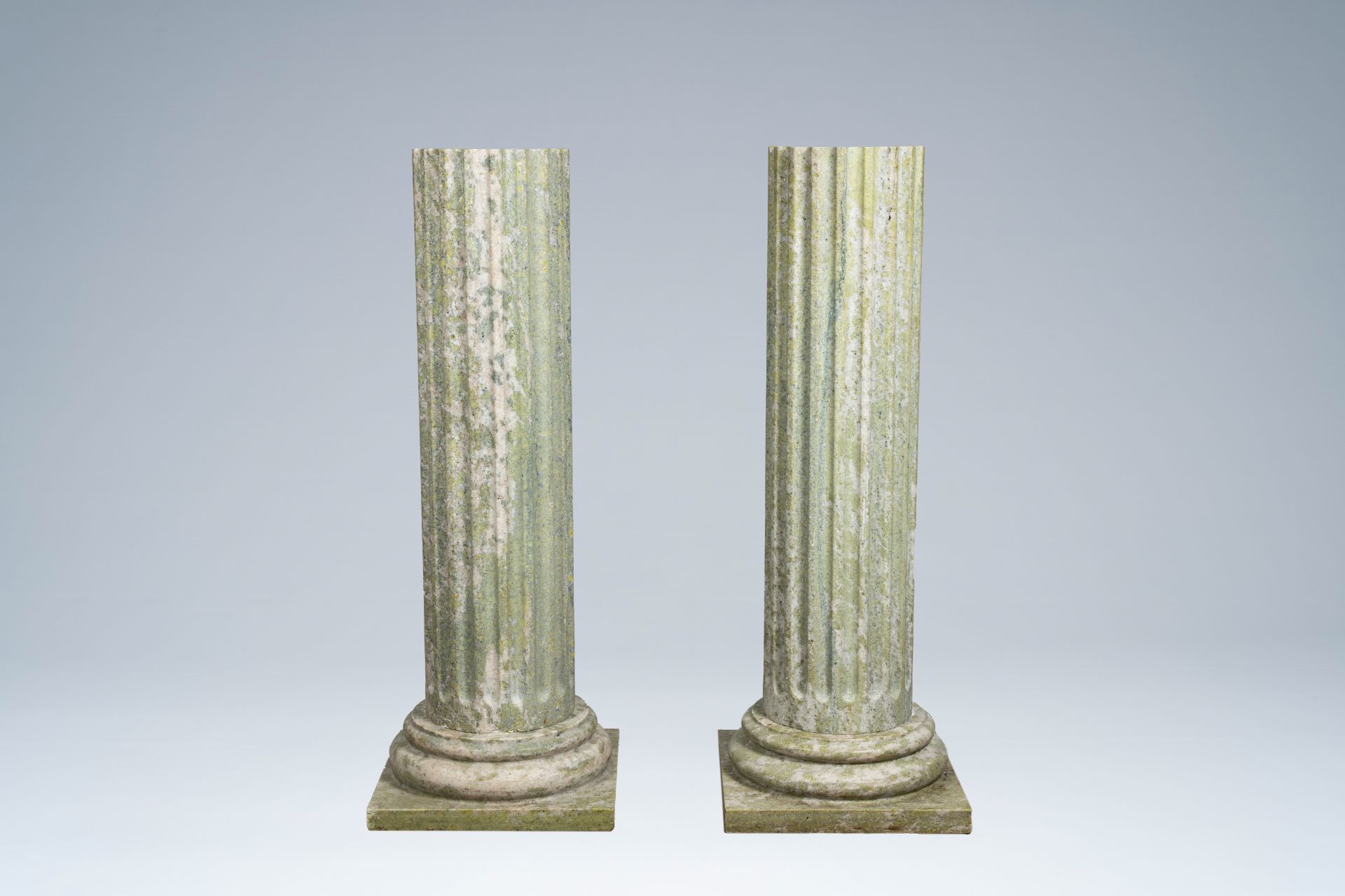 A pair of light green natural stone fluted columns, 20th C. - Image 4 of 8