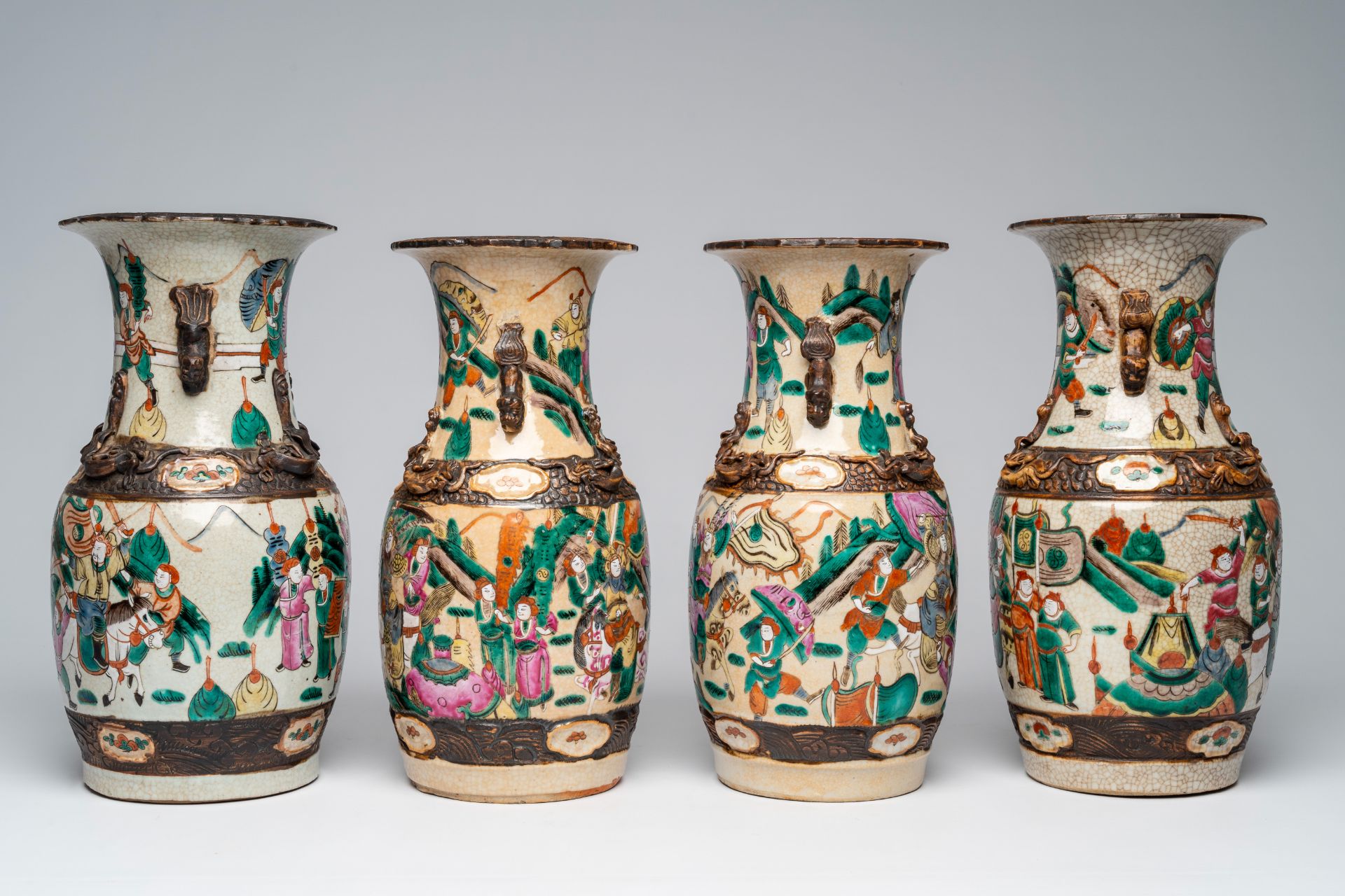 Four Chinese Nanking crackle glazed famille rose vases with warrior scenes, 19th C. - Image 5 of 7