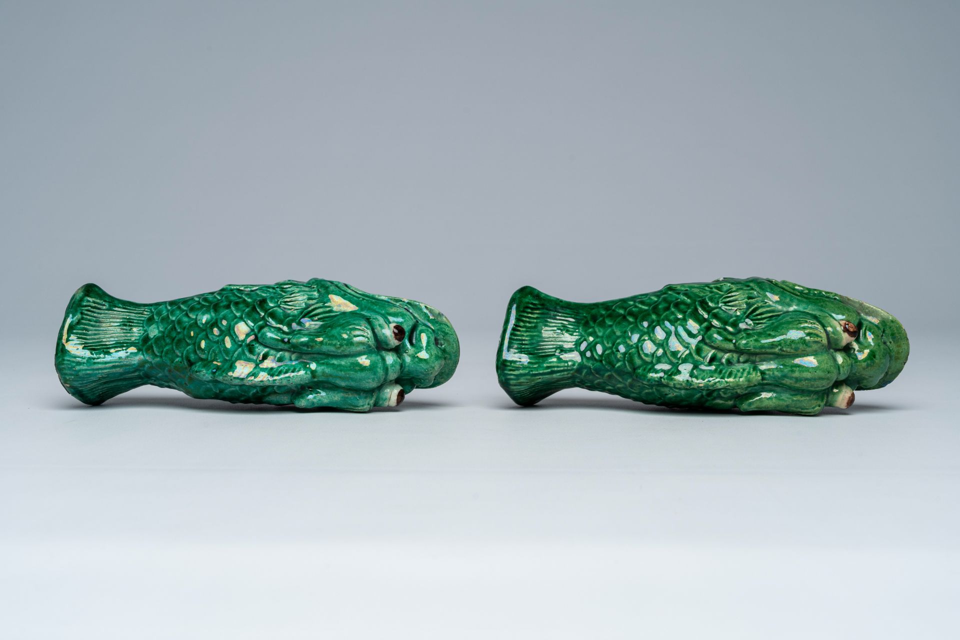 A pair of Chinese green glazed earthenware 'carp' wall vases, ca. 1900 - Image 6 of 7