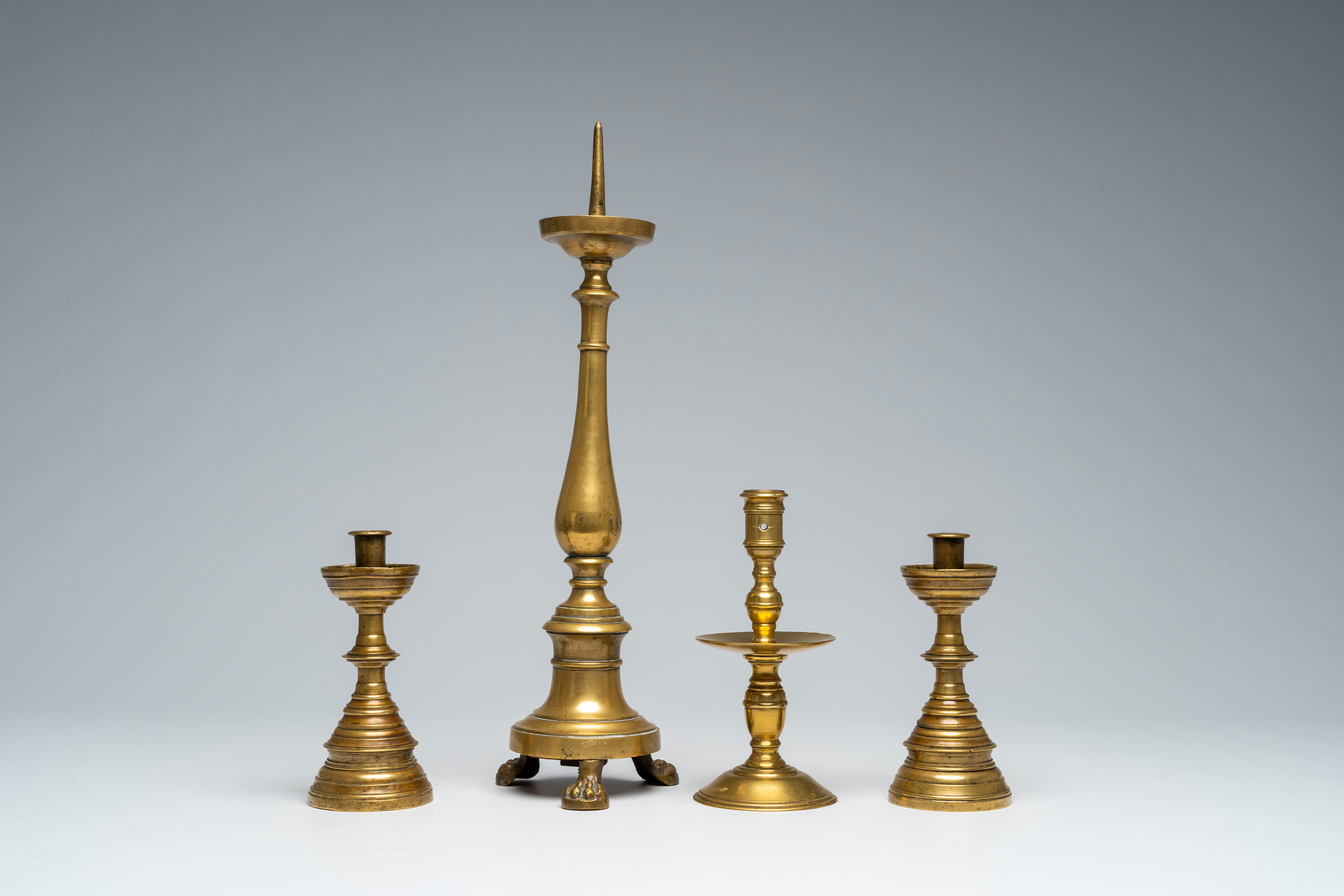 Four various bronze and brass candlesticks, 17th C. and later - Image 4 of 7