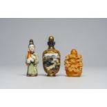 Three Chinese polychrome porcelain and horn snuff bottles, 20th C.