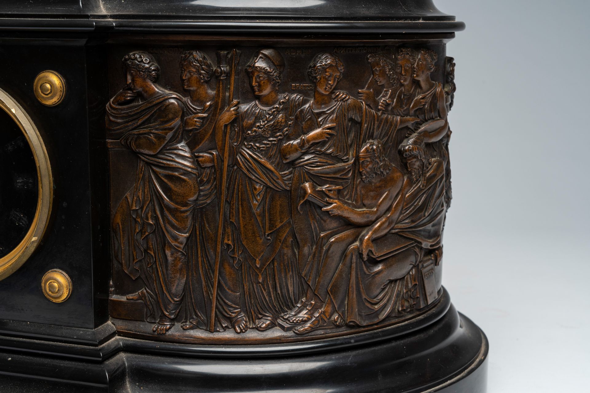 A French black marble mantel clock with a 'Greek goddesses' frieze surmounted by a patinated bronze - Image 8 of 11
