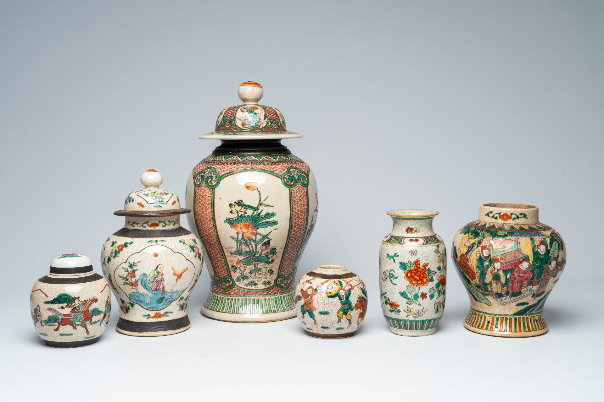 A varied collection of Chinese Nanking crackle glazed famille rose and verte porcelain, 19th/20th C.