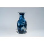 A Chinese blue and white 'dragon chasing the pearl' vase, 19th C.