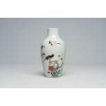 A Chinese famille rose vase with birds among blossoming branches, 20th C.