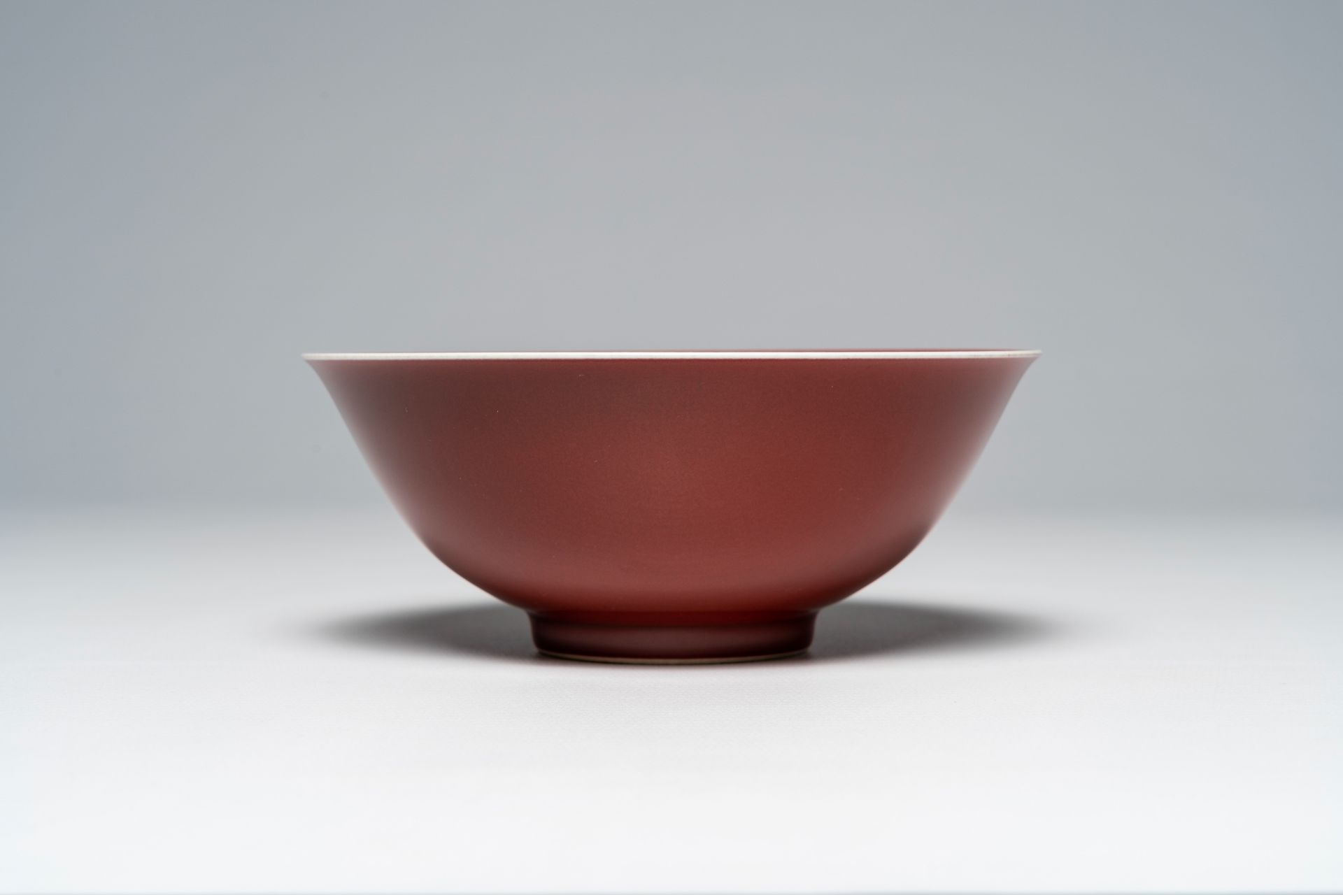 A Chinese monochrome liver red bowl, Qianlong mark, 19th/20th C. - Image 5 of 7