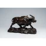 Illegibly signed (20th C.): Water buffalo, brown patinated bronze