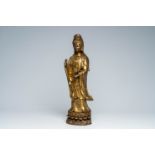 A large Chinese gilt copper sculpture of a standing Guanyin with ruyi sceptre on a lotus throne, Rep
