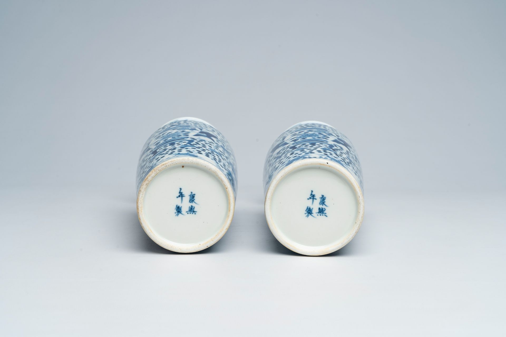 A pair of Chinese blue and white vases with boys and antiquities, Kangxi mark, 19th C. - Image 6 of 6