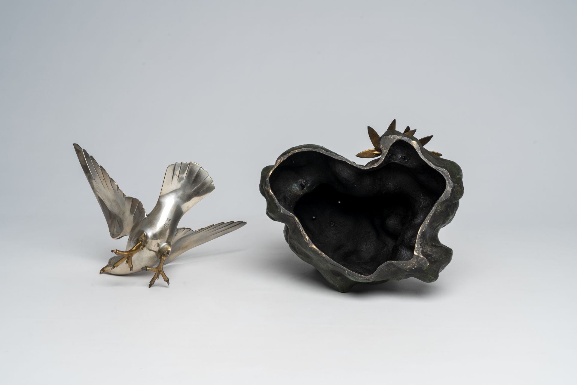 A Japanese patinated and silver-plated metal okimono of an eagle on a rock, signed Hidemasa, 20th C. - Image 7 of 17