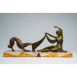 French school: A lady in evening dress with her borzoi, gilt and green patinated spelter on an onyx