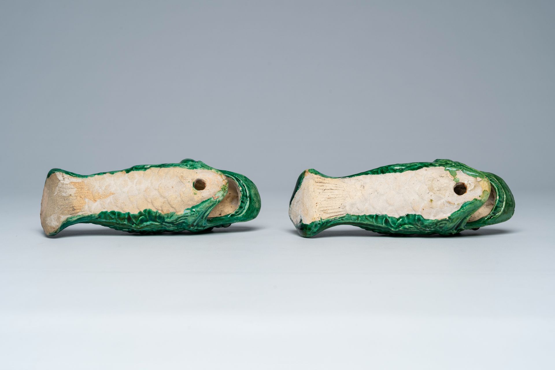 A pair of Chinese green glazed earthenware 'carp' wall vases, ca. 1900 - Image 7 of 7