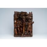 An impressive carved wood relief depicting the imprisonment of a bishop, Southern Netherlands, 16th