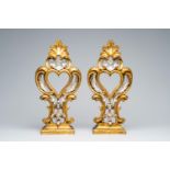 A pair of Italian Rococo carved, silver-plated and gilt wood heart-shaped reliquaries, 18th C.